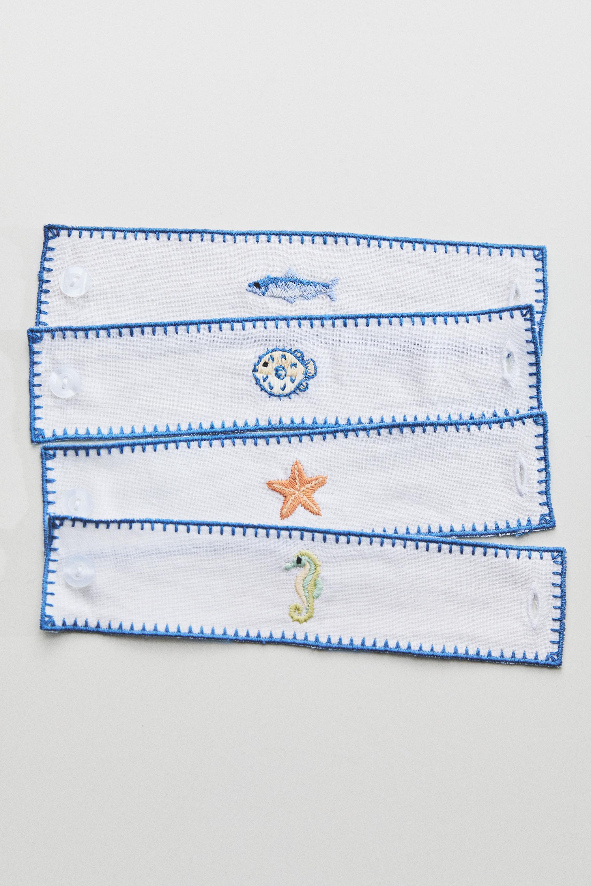 LOT DE 4 RONDS DE SERVIETTE EN RAMIE